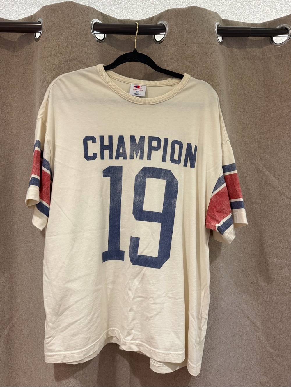 Champion Cream Short Sleeve '19 Graphic Tee with Navy & Red Accents